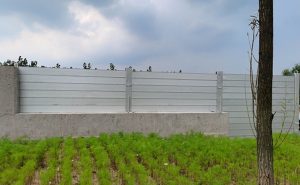 Demountable flood barriers stored and reused after flood protection